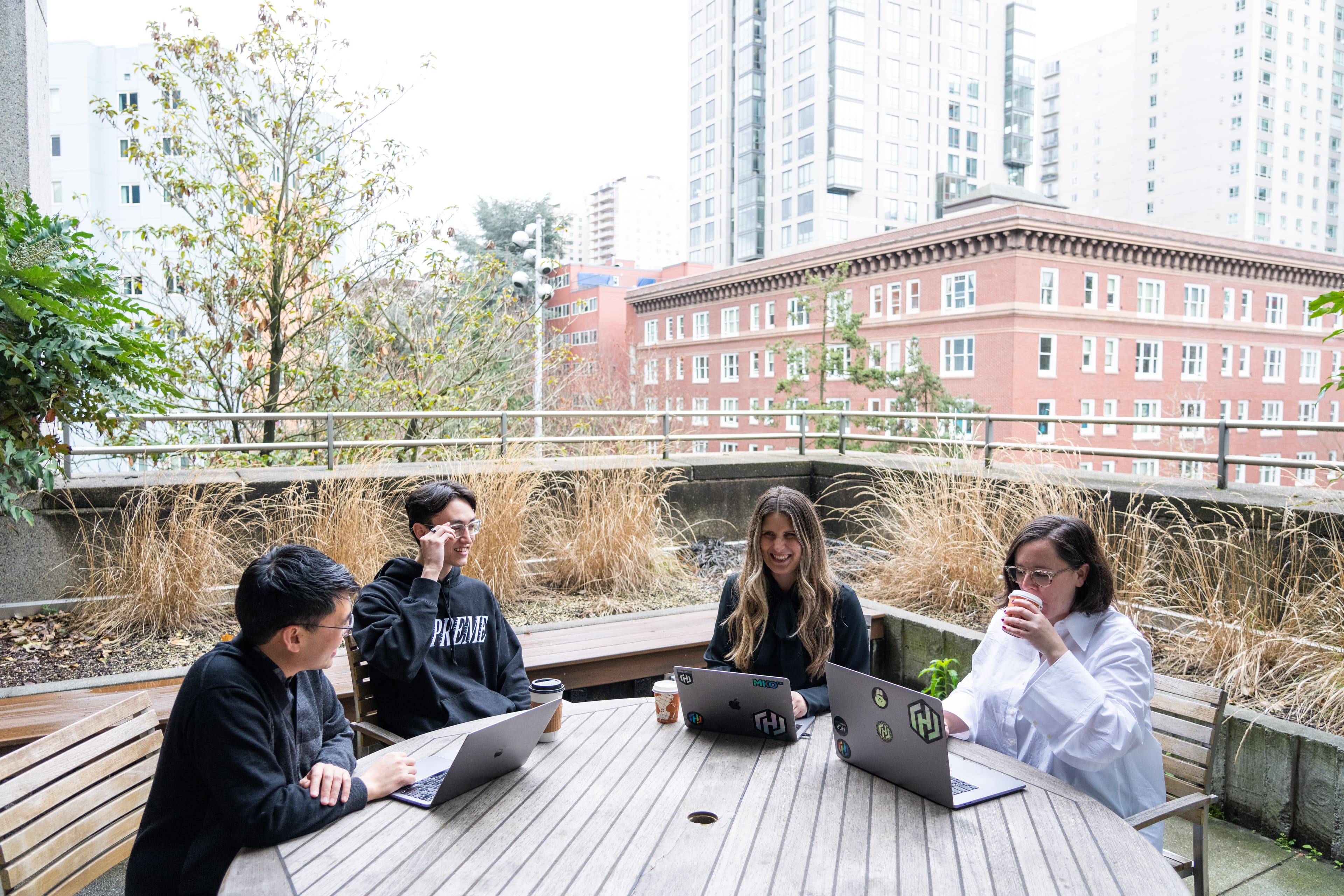 People gathered around a table collaborating